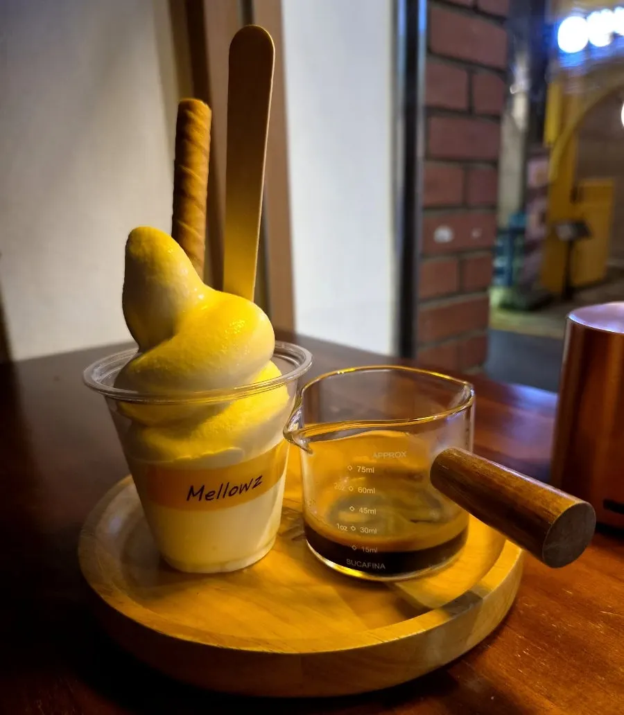 Ice cream with nuts and matcha syrup