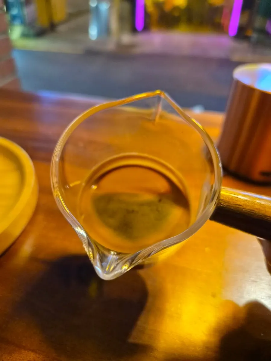Affogato served with an espresso shot