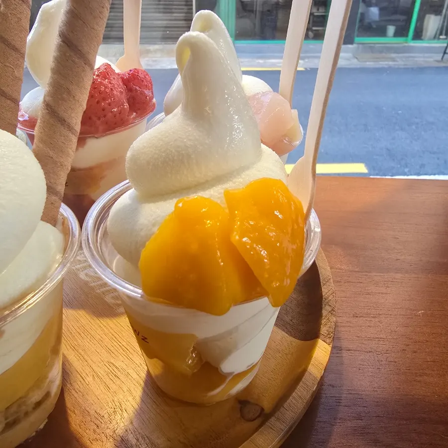 Soft serve with large chunks of mango