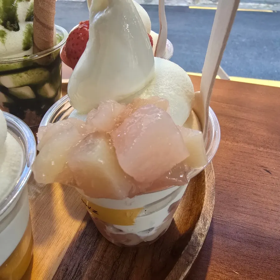 Soft serve with pink peach purée