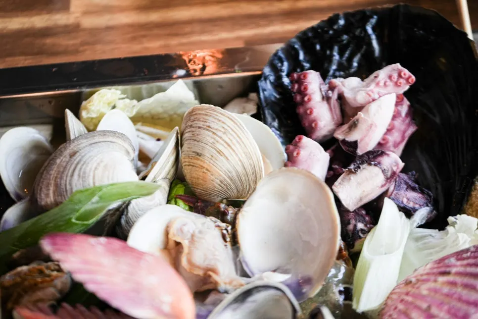 Pot full of clams and seafood