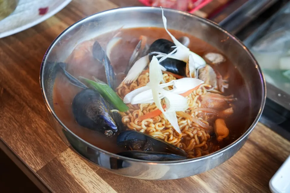 Octopus dipped into cheese fondue