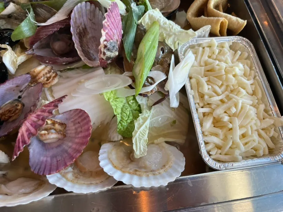 A generous amount of leftover clam soup and broth