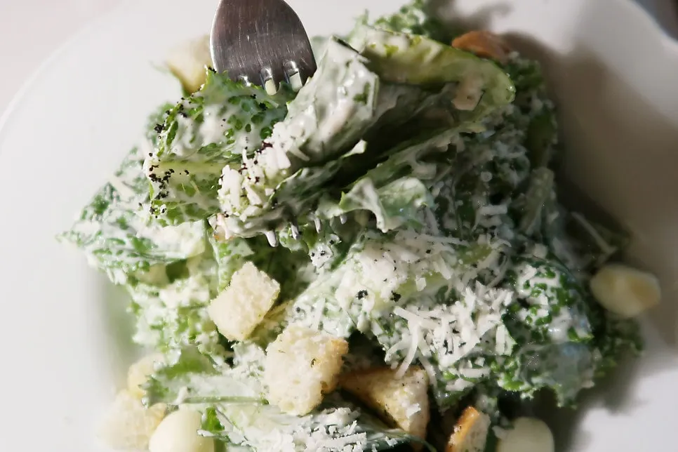 A forkful of Caesar salad