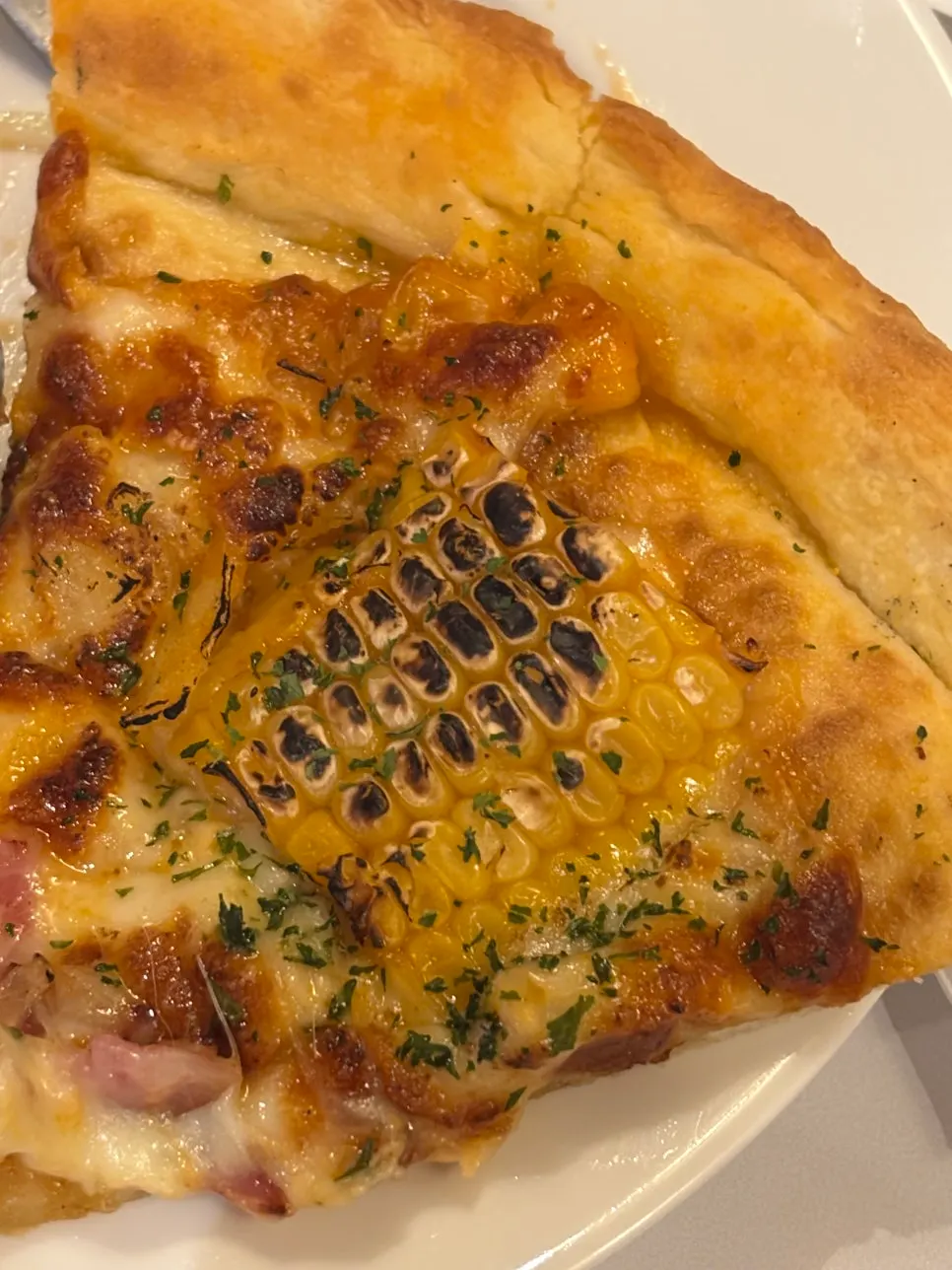A table set with lasagna and pizza together