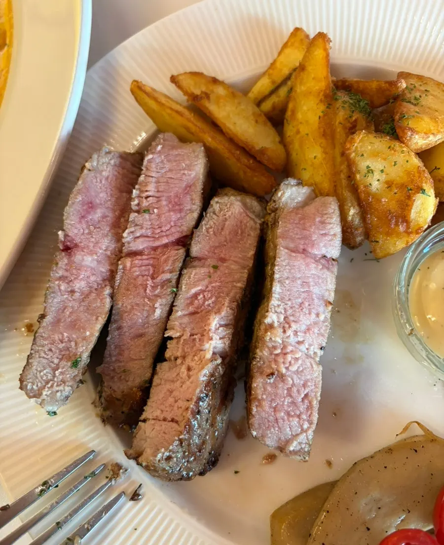Plated sous vide pork neck steak