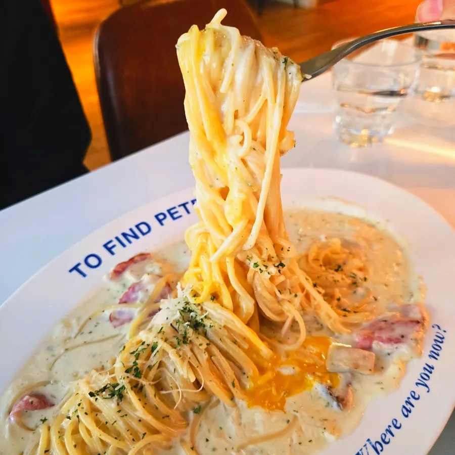 Carbonara pasta with egg yolk mixed in