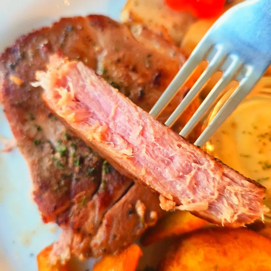 Cross-section of the sliced sous vide pork neck steak