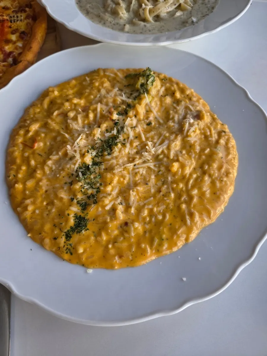 Spicy crab risotto topped with crab meat