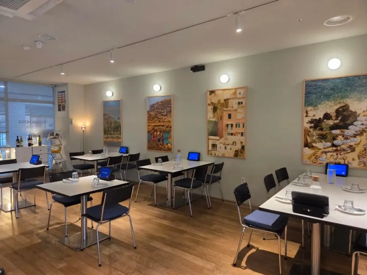 Dining hall at Two Find Peter Incheon Nonhyeon Branch with framed art on the walls