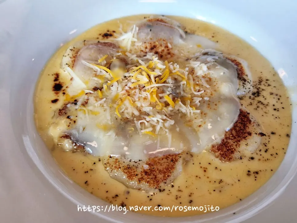 Gnocchi covered in a four-cheese sauce