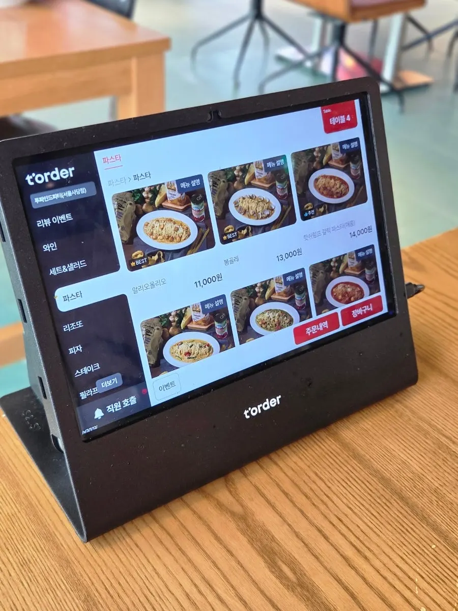 Menu page listing pasta and steak dishes