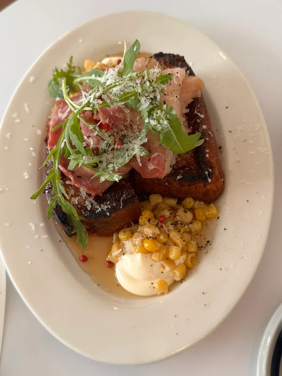 A plate of Teuwaetmoa's corn bacon French toast