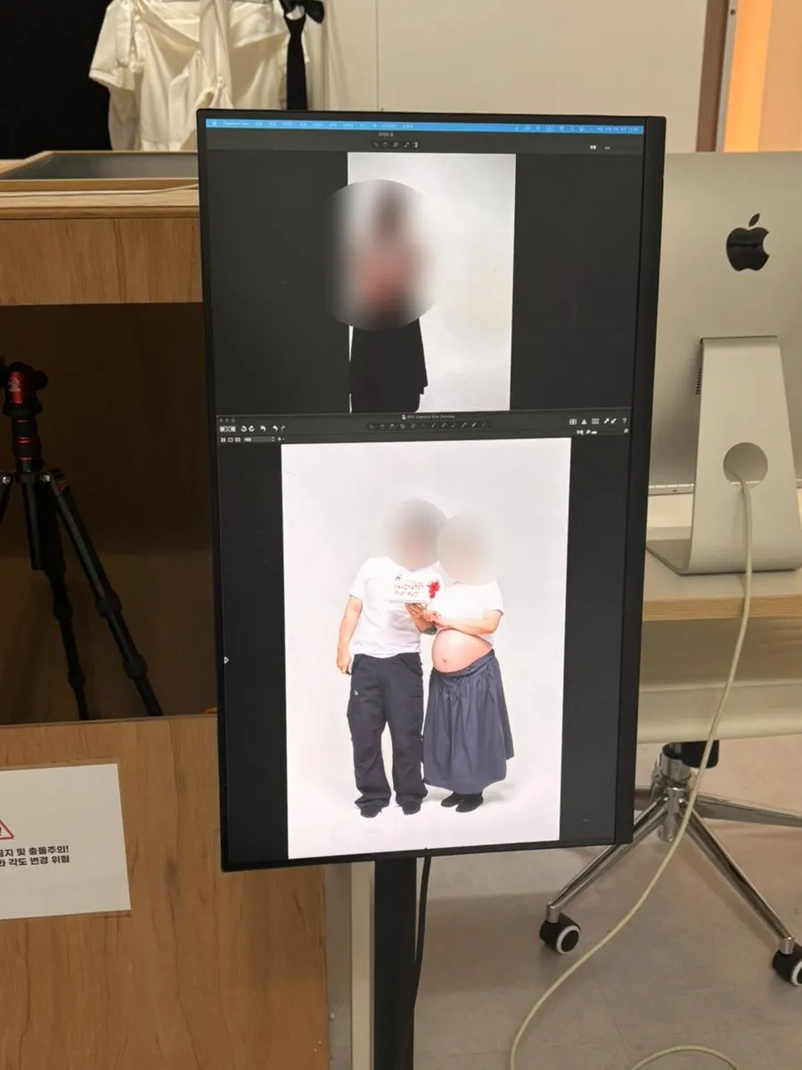Sample photos on the wall for pose reference