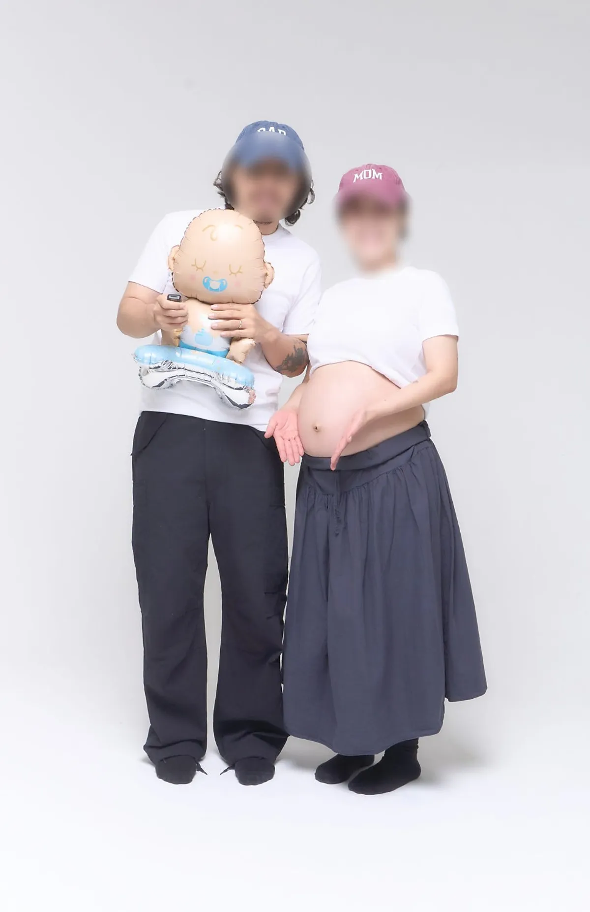 Retouched printed photo of the couple's maternity shoot