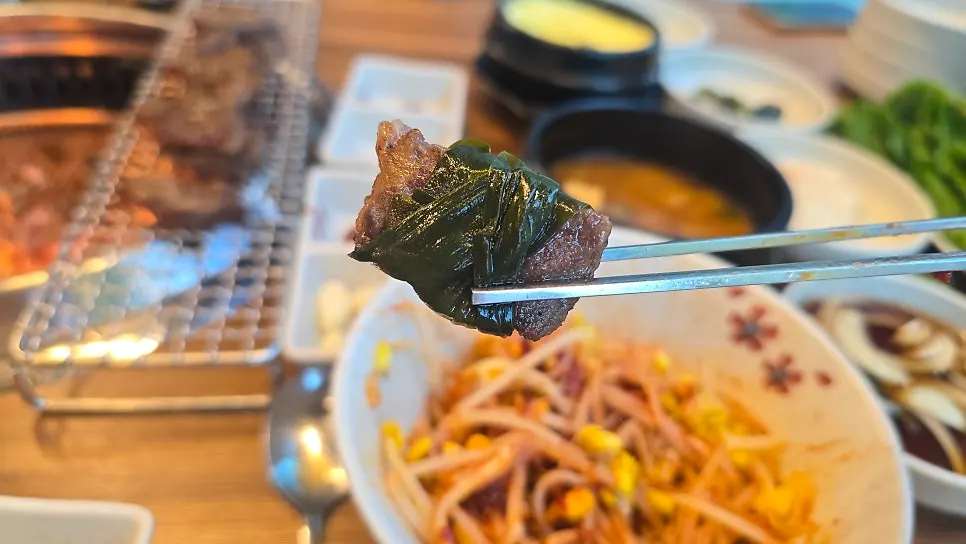 Rib wrapped with self-serve myeongi namul and baek kimchi