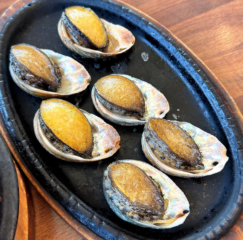 Six butter-grilled abalones