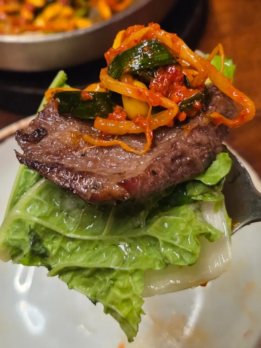 Sharing woodae galbi with a friend
