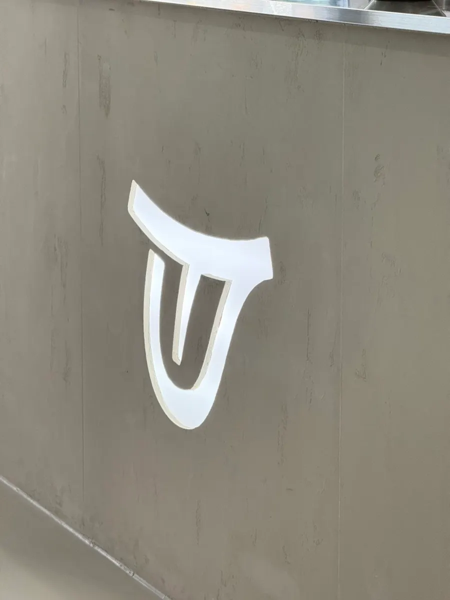 Ugly Tongue logo shaped like a tongue