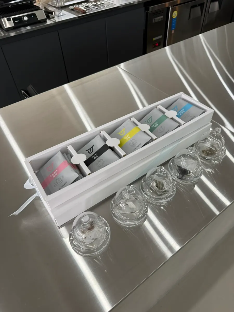Tea selection displayed on one side of the store