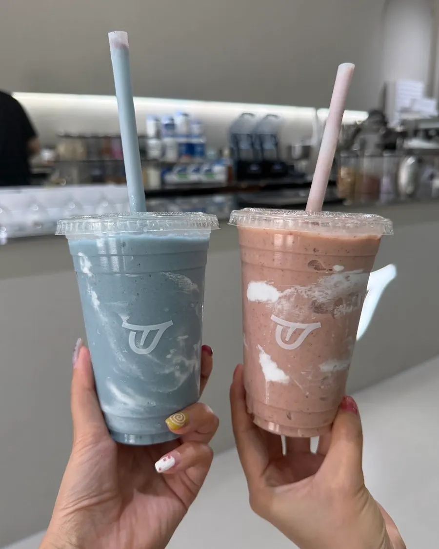 Stress Down and Brain Activation smoothies held side by side