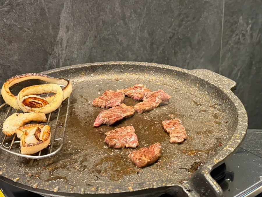 Chuck flap served with grilled onions
