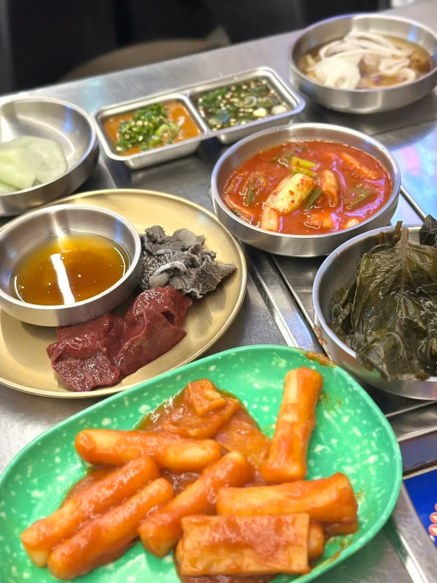 Sign explaining gopchang pre-seared then grilled by staff