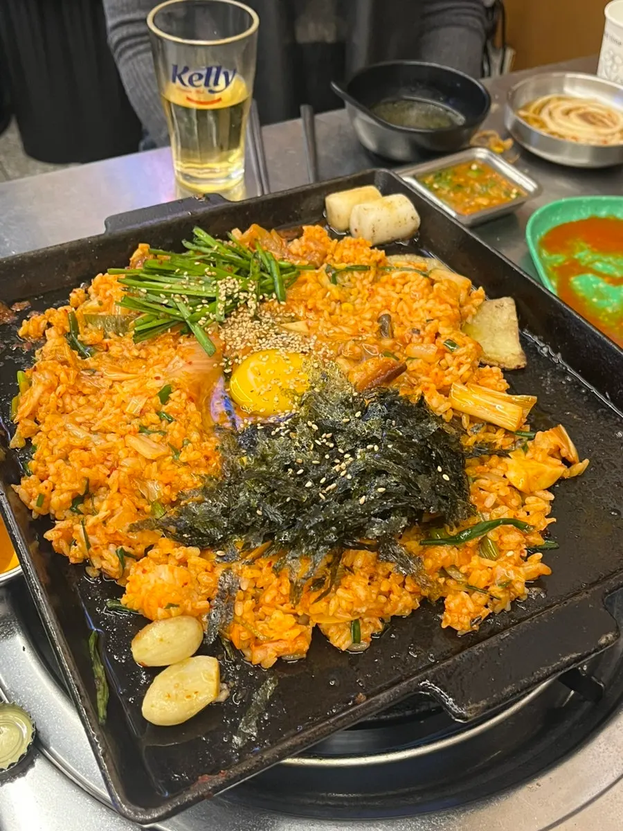 Fried rice topped with egg yolk