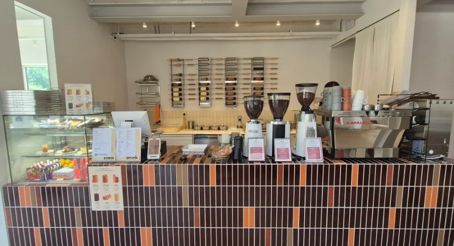 Counter with espresso machine and grinders