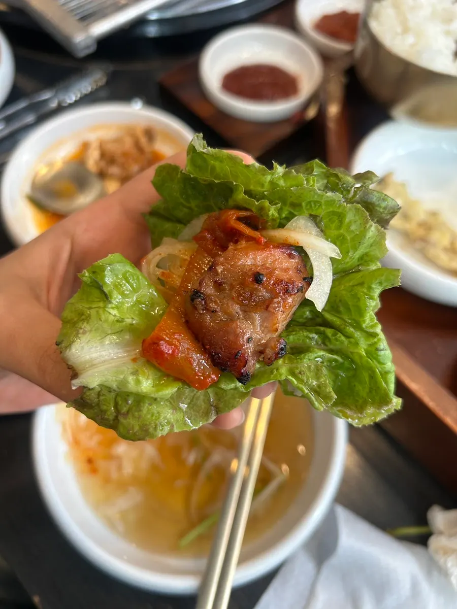 Handmade marinated galbi grilling on the tabletop grill