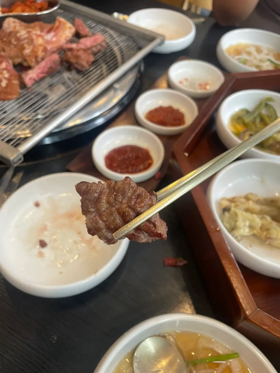 A grilled piece of raw beef short rib