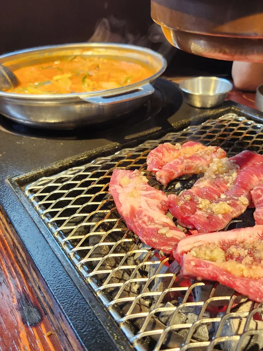 A bite of grilled beef ribs