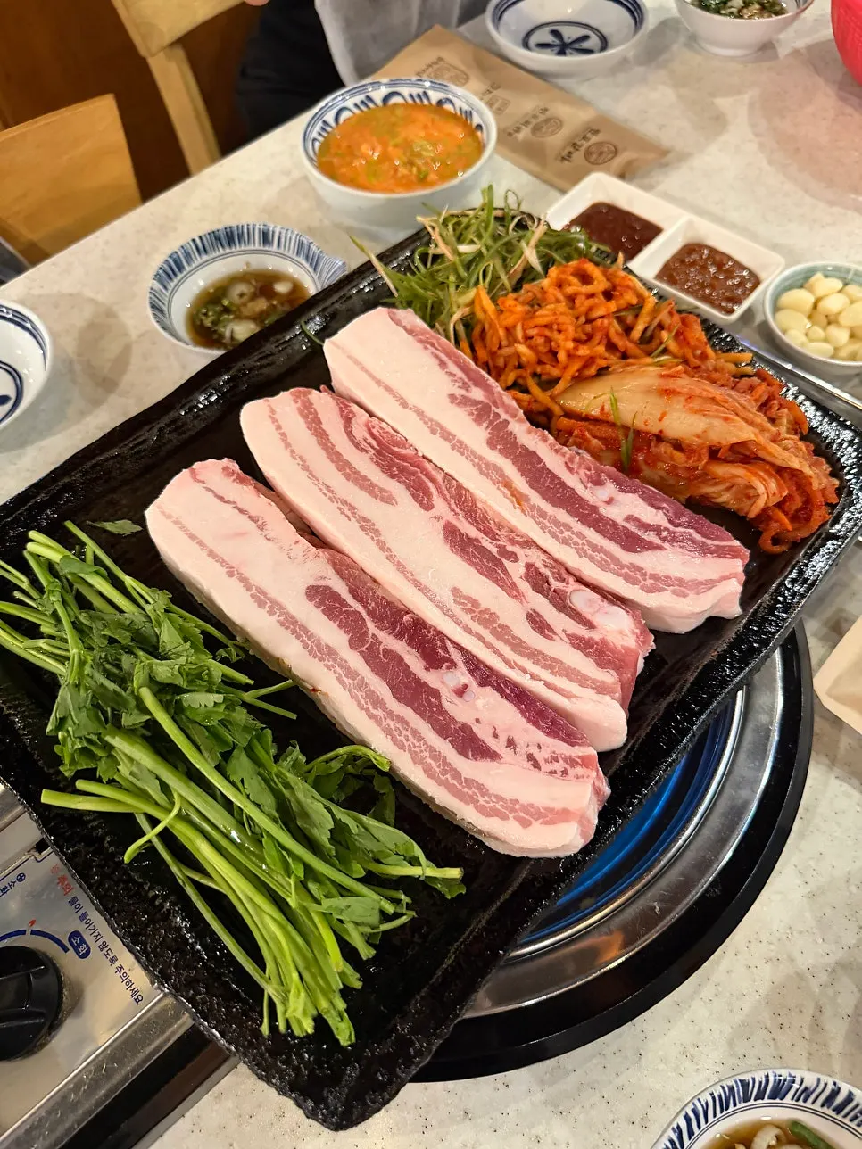 Thick pork belly on the grill