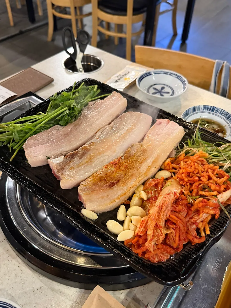Grilled pork belly with juices flowing