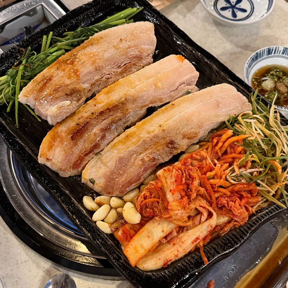 A well-grilled piece of pork belly