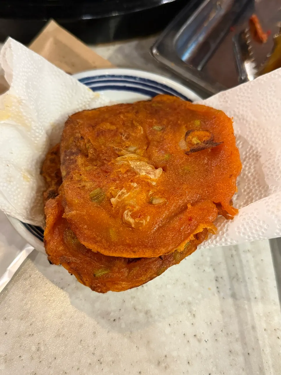 Finished minari-kimchi pancake on the grill