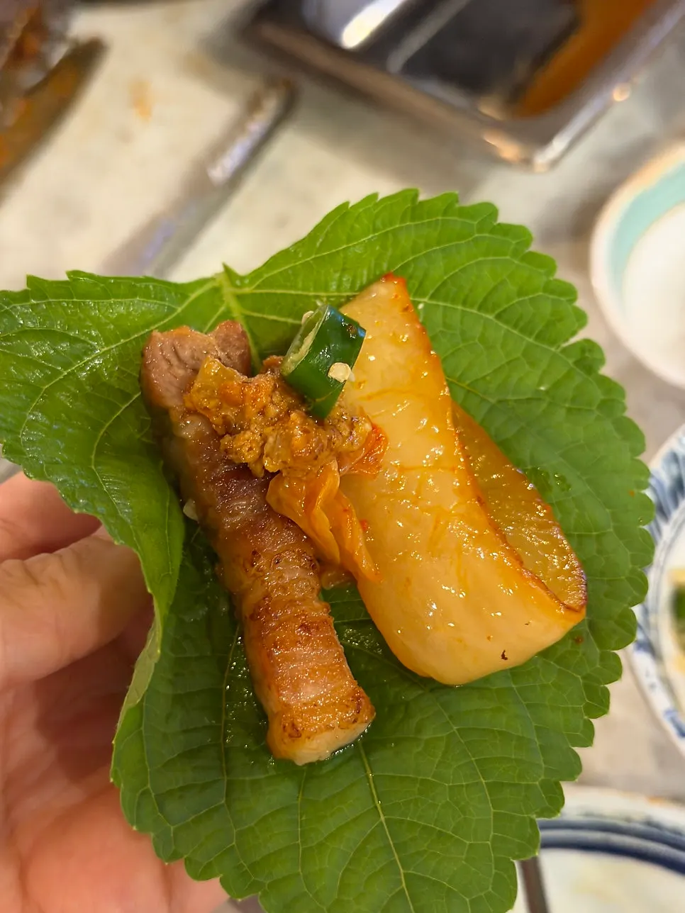 Meat wrapped in Haenam cabbage kimchi