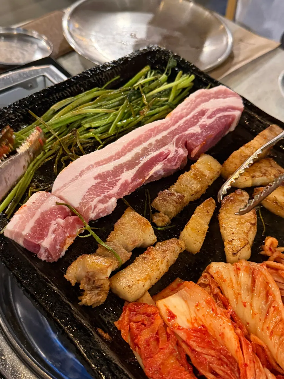 Extra serving of pork belly with freshly reset kimchi