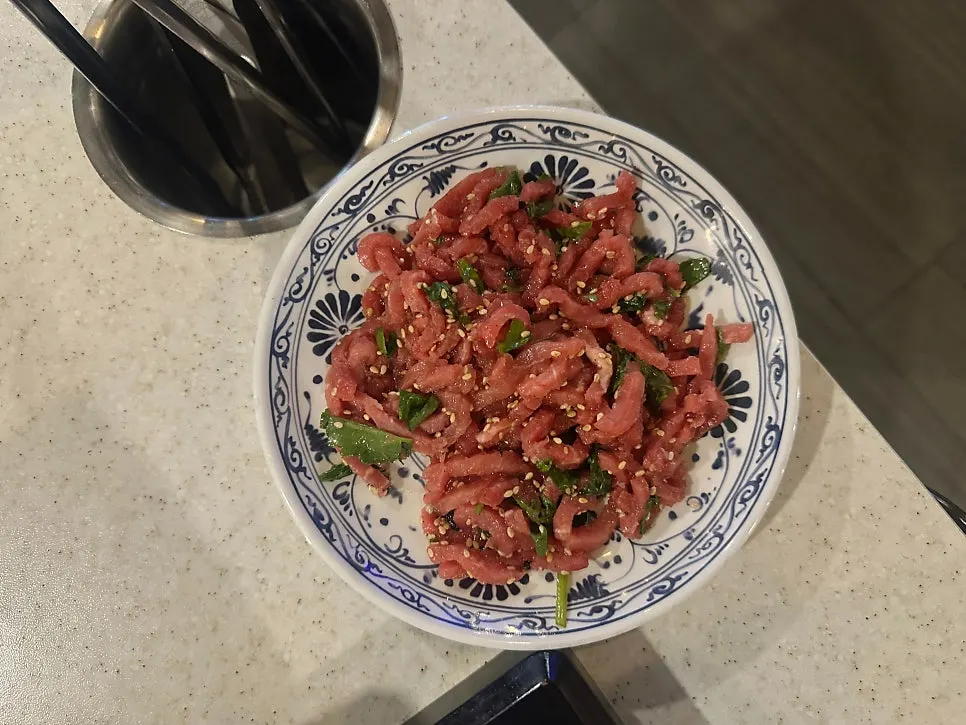 Seasoned beef tartare served as a standard side dish