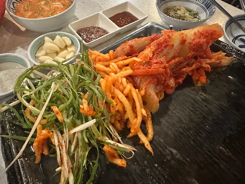Haenam cabbage kimchi and minari on the grill