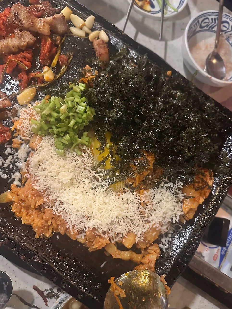Fried rice topped with seaweed flakes and cheese powder
