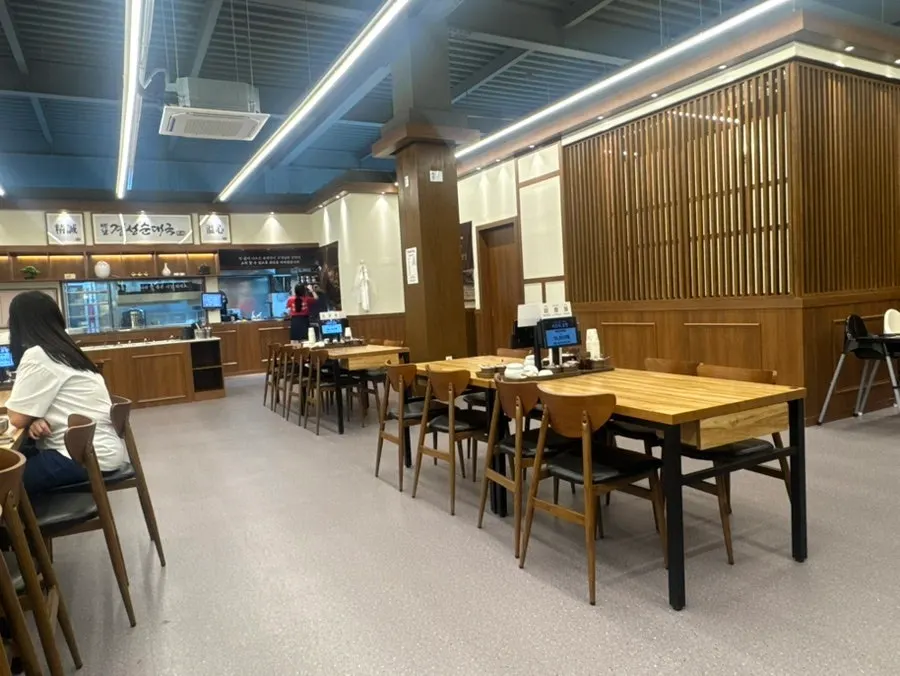 Spacious hall seating suitable for group gatherings