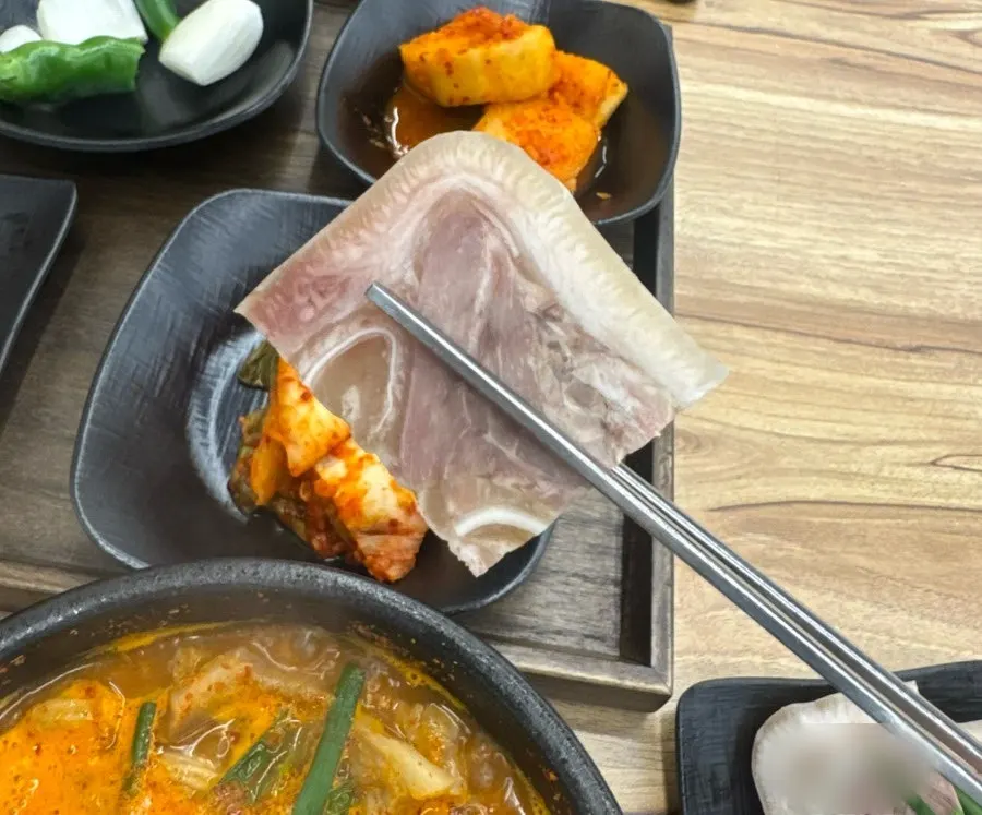 Close-up of spicy sundaeguk loaded with meat