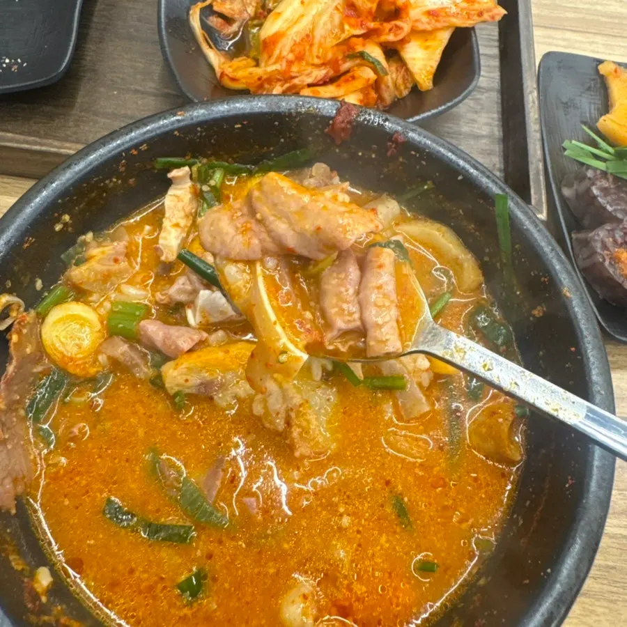 A spoonful of tender meat from the sundaeguk