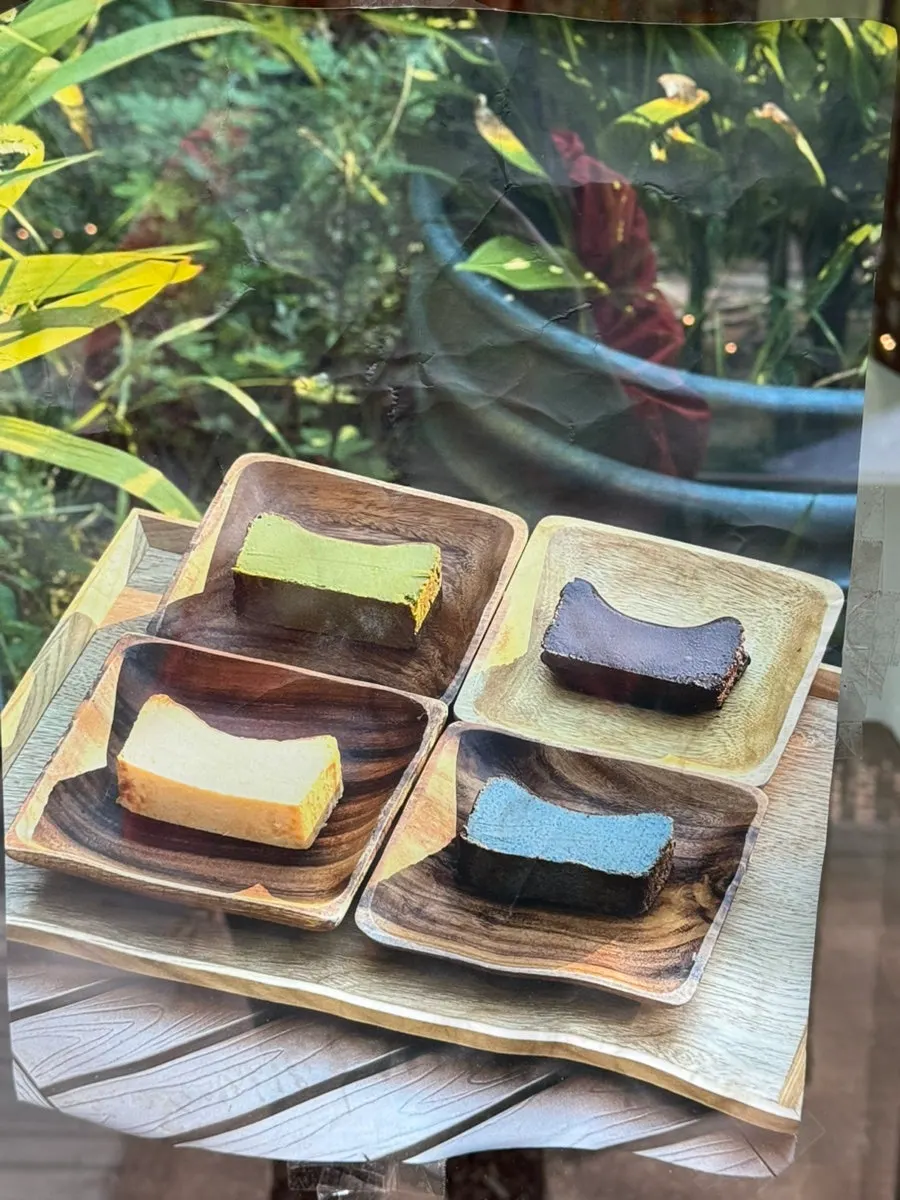Basque cheesecake served on a wooden plate