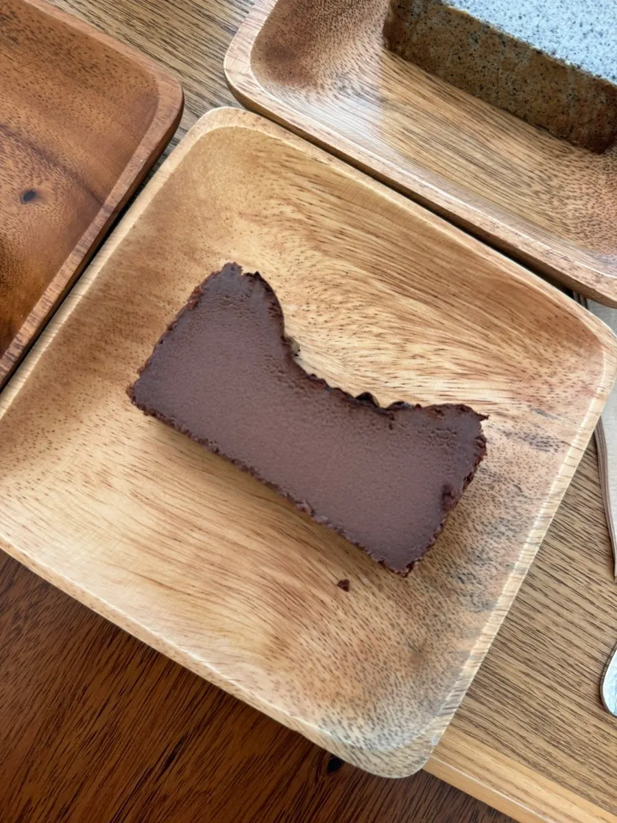 A slice of chocolate Basque cheesecake