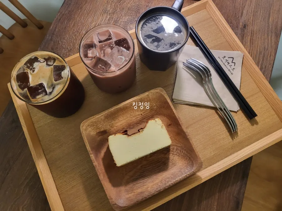 Coffee and cake set on an outdoor table