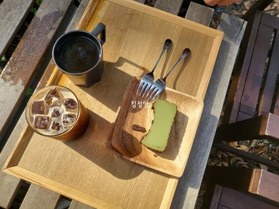 A slice of matcha Basque cheesecake