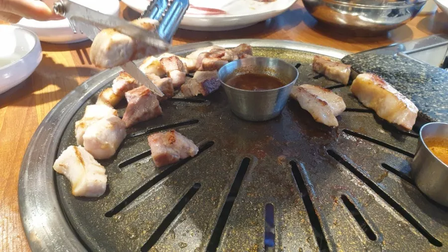 Remaining meat and doenjang jjigae on the table