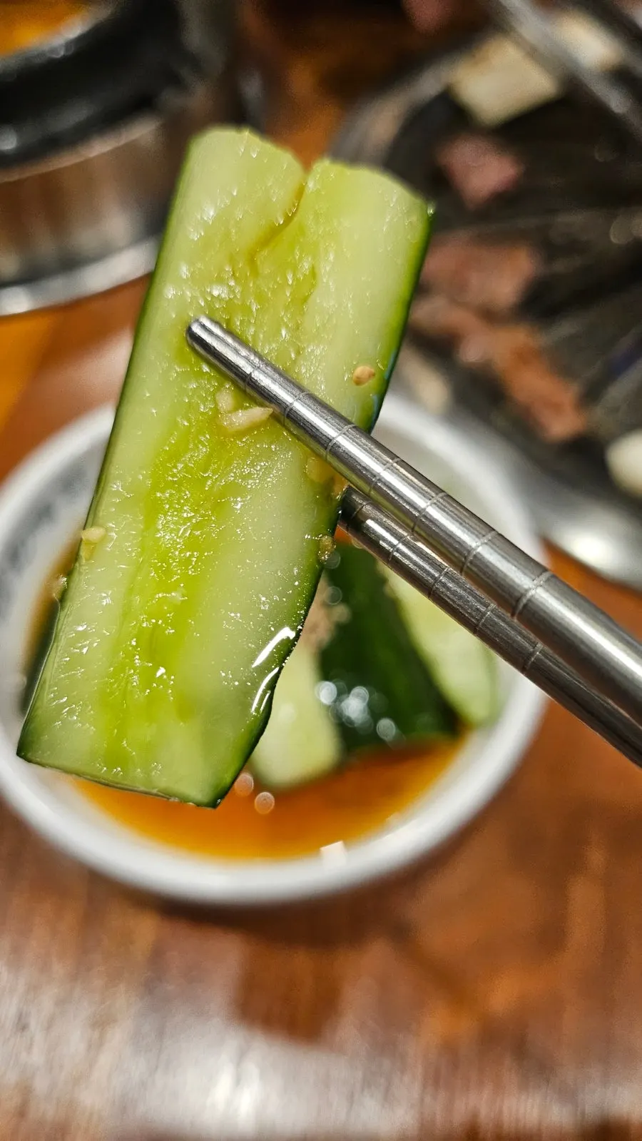 Scallion salad and fresh kimchi among the BBQ side dishes